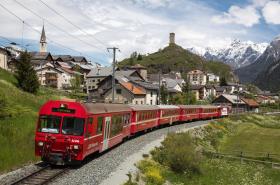 A train of the Rhaetian Railway in Ardez in the canton of Graubünden