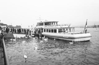 Passengers boarding a ship.