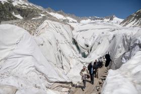 People visit the Rhone Glacier