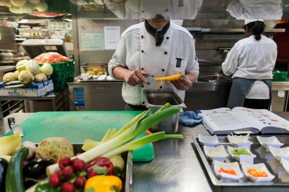Cooks at work in a kitchen