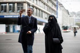 Algerian businessman and political activist Rachid Nekkaz in St. Gallen on Wednesday with a woman in a burka.