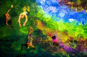 People take part in art performance by Swiss artist Pipilotti Rist in Bern on October 7, 2018