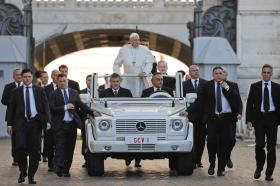 Pope Francis arrives with the popemobile in St.Peter s Square on the day he compared abortion to hiring a hitman.