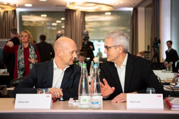 Top businessmen talk at M and A press conference