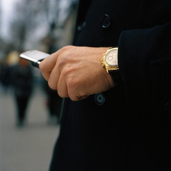 Man wears Rolex watch