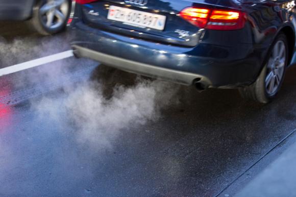 car emitting exhaust fumes