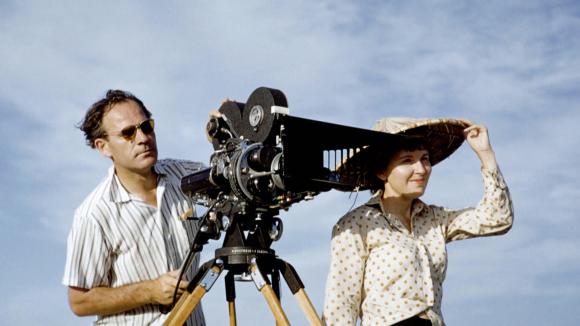 Swiss filmmaker Ernst A. Heiniger behind a film camera