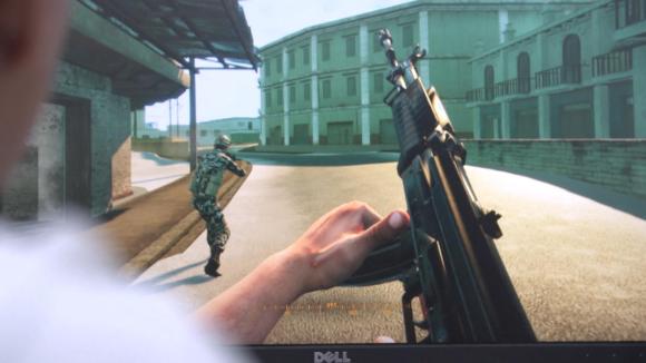 Shooting game on computer monitor
