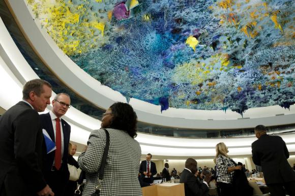 Delegates in the main conference room await the start of the 40th session of the Human Rights Council