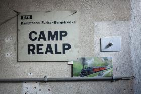 camp realp sign