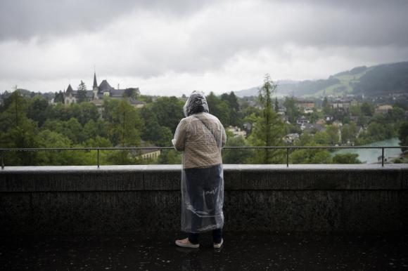 Tourist in the rain in Bern