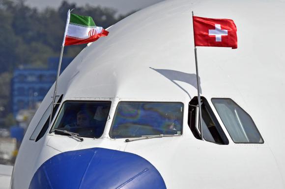 Iranian and Swiss flags on an aircraft