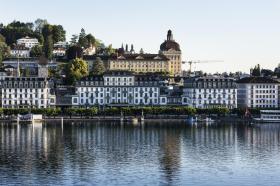 building reflected in lake