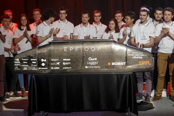 EPFL students and their transport capsule