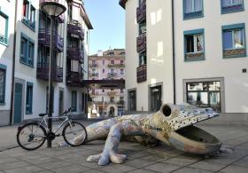 Escultura de lagarto no centro de Genebra