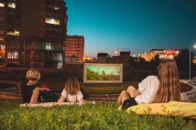 Kids watching open air film screening