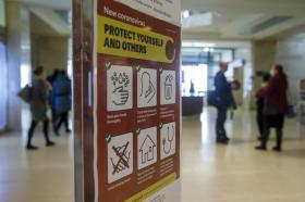 Information regarding the new coronavirus is displayed throughout the European headquarters of the United Nations in Geneva