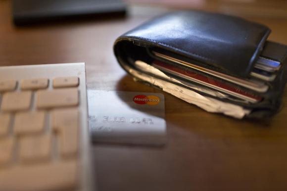 Wallet laying by a computer keyboard