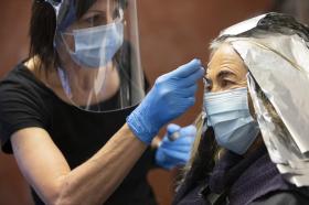 woman having brows dyed