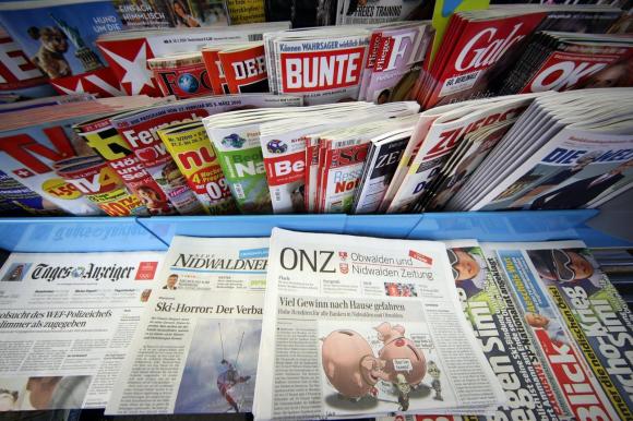 Newspapers at a newsstand