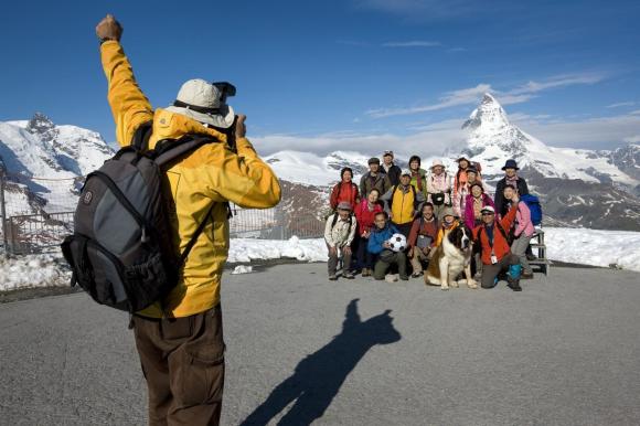Tourists in front of Matterhorn mountain