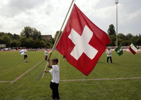 Boy with Swiss flag