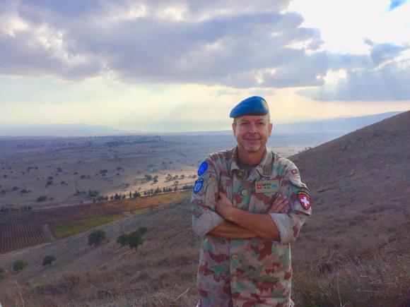 Mark in UN peacekeeper s cap on mountain