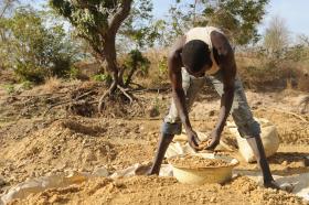 Africa artisinal gold miner