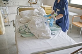 Hospital bedding being changed