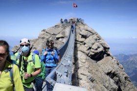 Tourists wearing face masks in the mountains