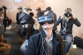 People wearing virtual reality goggles