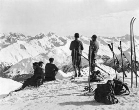 Skiers enjoy mountain scenery