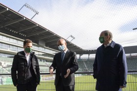 Interior MInister Berset with two other men inside the St Gallen football stadium