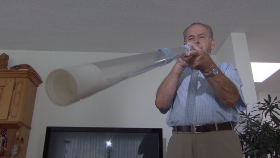 playing didgeridoo