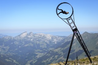 Switzerland s and Australian acrobatic artist Ramon Kathriner performs on a ÒWheel of DeathÓ