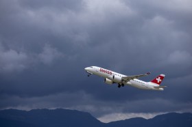 Swiss plane over Geneva Airport.
