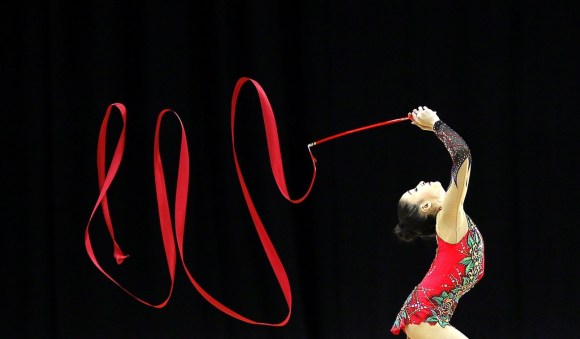 Gymnast performing on the ribbon