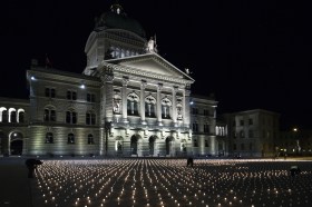 Swiss citizens light 9,200 candles in front of the federal parliament in Bern.