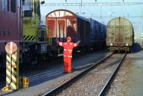 Railway worker and freight trains