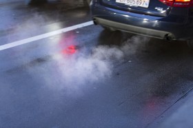 Car exhaust emitting fumes