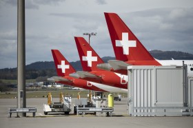 Aircraft waiting on tarmac at Zurich Airport.