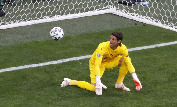 Yann Sommer watches the ball go into the net