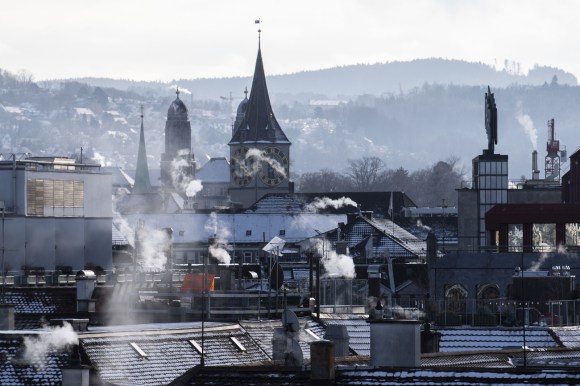 Smoke coming out of buildings.