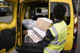 Swiss Post worker with packages