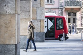 A self-driving car and pedestrians
