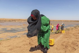 woman in drought-hit land