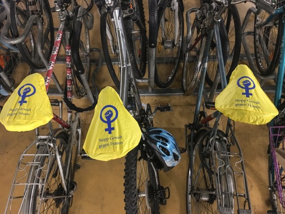 Bicycle saddles with Stop violence against women covers
