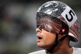 Athlete with crash helmet