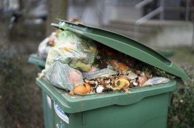 Compost bin full of discarded produce