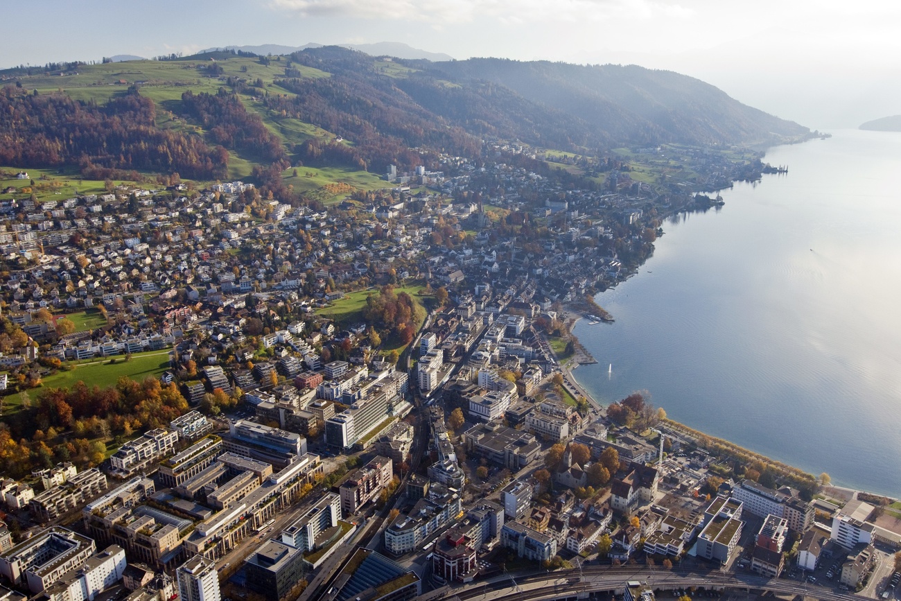 Die Schweiz zeigt die Aufschlüsselung der Einnahmen für den globalen Körperschaftsteuersatz